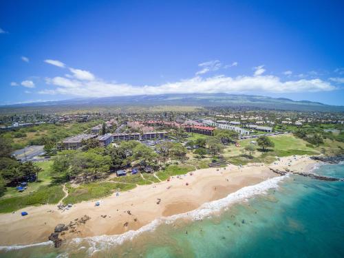 an aerial view of a beach with people on it at 126 Hale Kamaole in Wailea