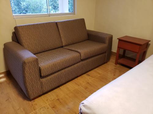 Posezení v ubytování Condominio La Curva