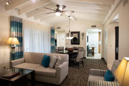 a living room with a couch and a table at Scottsdale Camelback Resort in Scottsdale