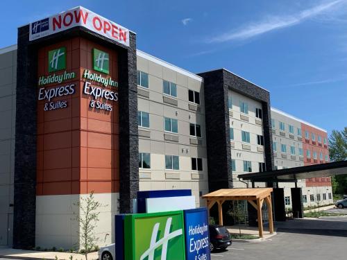 a building with a now open sign in front of it at Holiday Inn Express & Suites - Courtenay - Comox by IHG in Courtenay