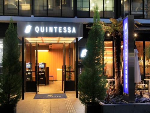 an entrance to a building with a sign that reads guunella at QuintessaHotel FukuokaHakata Relax&Sleep in Fukuoka