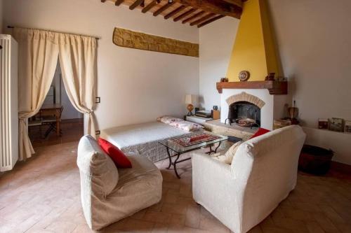 Ruang duduk di Casetta rustica nel Chianti