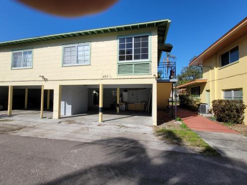 a large house with a driveway in front of it at CLR St. Pete in St Petersburg