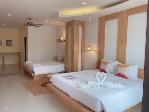 Vuode tai vuoteita majoituspaikassa Wangpruksa Resort