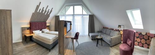 Postel nebo postele na pokoji v ubytování Hotel Mainpromenade ***S