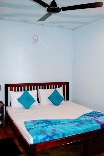 Katil atau katil-katil dalam bilik di Wallama Villa