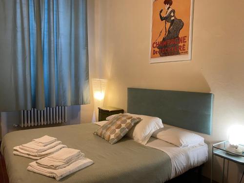 Letto o letti in una camera di Corte Meraviglia - Relais