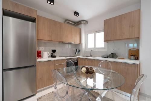 Кухня или мини-кухня в “Athens Cosmos” Apartment in Neos Kosmos

