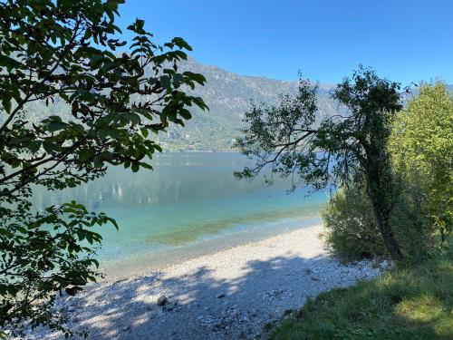 a beach with a view of a body of water at Casa Paola in Vesta