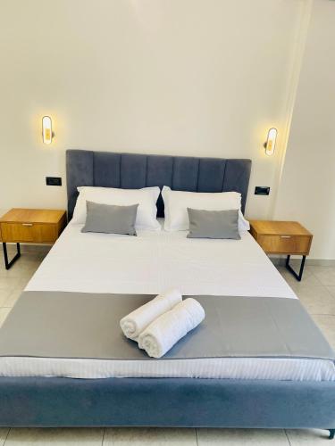 Postel nebo postele na pokoji v ubytování Maor Hotel