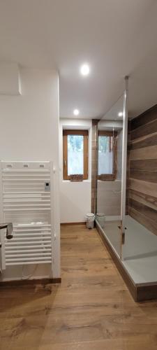 a bathroom with a staircase in a room at Chalet 1829 in Sainte-Foy-Tarentaise