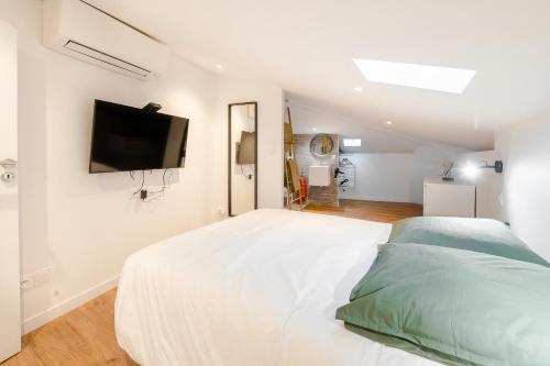 Postel nebo postele na pokoji v ubytování Le Saint-George - Charmant Duplex Climatisé