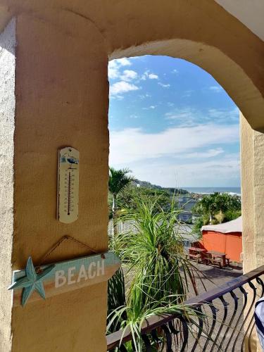a view of the beach from a building with a star sign at Crayfish Inn No.4 in Ramsgate
