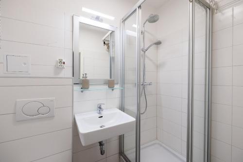 A bathroom at Cozy Apartment near Center