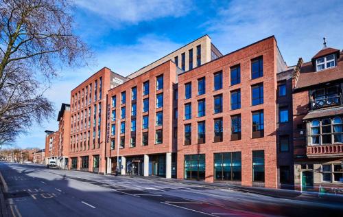 a large brick building on a city street at For Students Only York House Nottingham in Nottingham