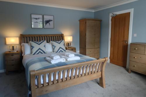 Cama ou camas em um quarto em Pink House Skye