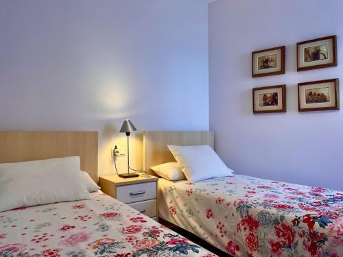 Postel nebo postele na pokoji v ubytování Bonito apartamento con piscina