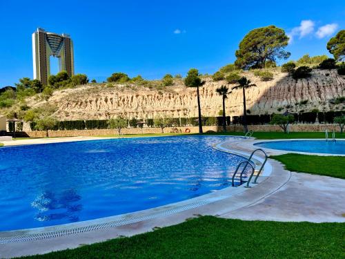 Bazén v ubytování Bonito apartamento con piscina nebo v jeho okolí
