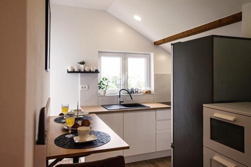 Apartman I & Jにあるキッチンまたは簡易キッチン