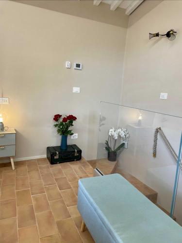 Ένα ή περισσότερα κρεβάτια σε δωμάτιο στο B&B La Fenice