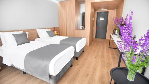 Hotel Memoir Kazbegi by DNT Groupにあるベッド