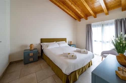 Postel nebo postele na pokoji v ubytování Apartaments Tee & Sea