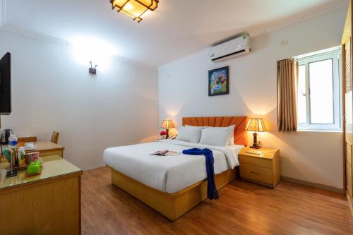 Cama o camas de una habitación en Blau Hotel