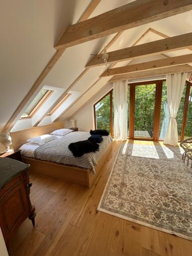 Postel nebo postele na pokoji v ubytování Leśna Residence & SPA