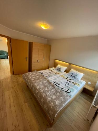 Postel nebo postele na pokoji v ubytování Apartma Ivana