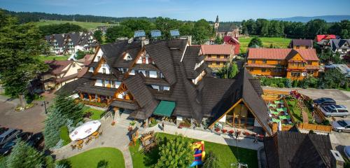 an aerial view of a large house at Hotel Toporów in Białka Tatrzanska