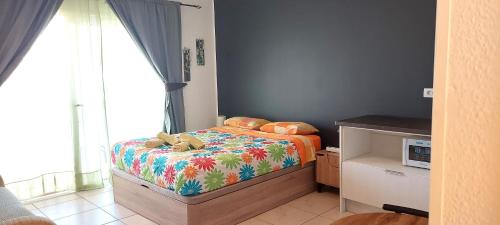 Krevet ili kreveti u jedinici u objektu Mareverde Blue Studio Tenerife
