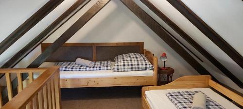 En eller flere senge i et værelse på Puszta Vendégházak 2.