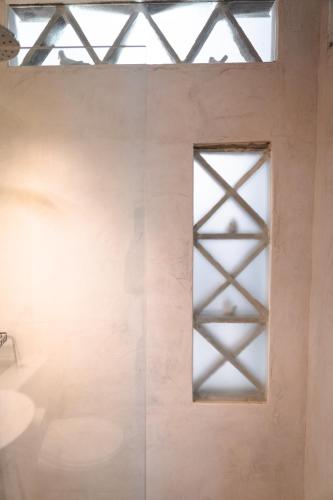 Ένα μπάνιο στο Aggelikoula Rooms 
