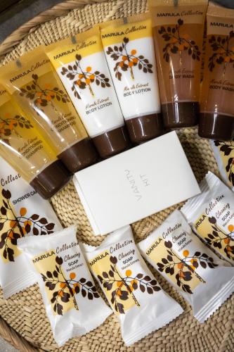 a basket of beeswax products on a table at MILIMA Big 5 Safari Lodge in Hoedspruit