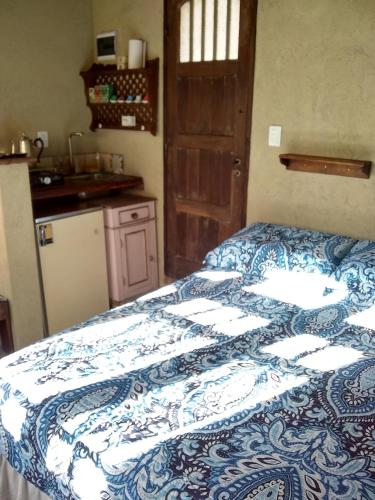 Ένα ή περισσότερα κρεβάτια σε δωμάτιο στο Casita de Piedra B&B