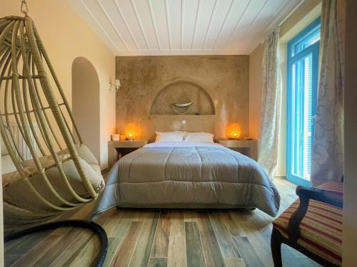 Postel nebo postele na pokoji v ubytování Amarienitas Suites
