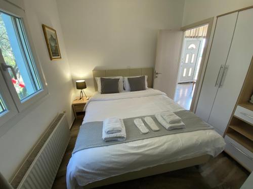 Ένα ή περισσότερα κρεβάτια σε δωμάτιο στο Villa Blue Apartments