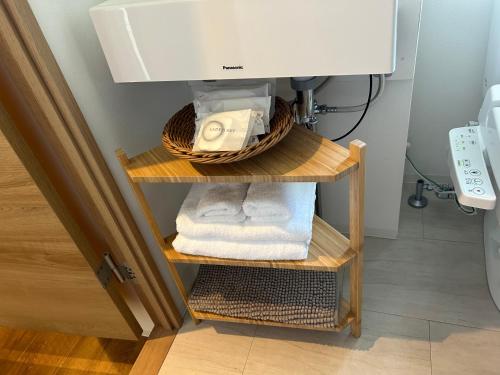 ห้องน้ำของ 近沙滩 冲浪圣地 鵠沼海岸独立式公寓 独立卫生间 带厨房 有洗衣机