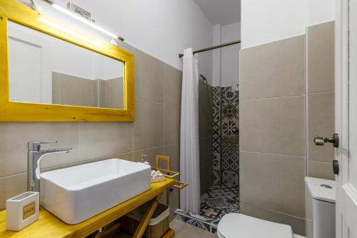 Et badeværelse på Servani Apartment