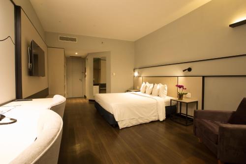 Cama ou camas em um quarto em Transamerica Lagoa dos Ingleses