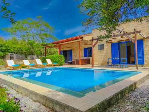a swimming pool in front of a house at Lemon Tree Villa with Private Pool and Starlink Internet in Frés