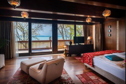 Posteľ alebo postele v izbe v ubytovaní Mala Garden Design Hotel