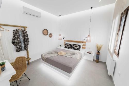 Katil atau katil-katil dalam bilik di Petros Studios & Suites