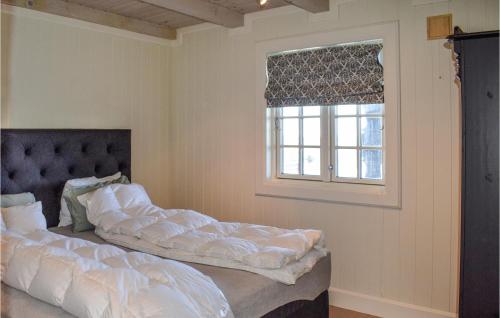 מיטה או מיטות בחדר ב-Lovely Home In Rauland With House A Mountain View