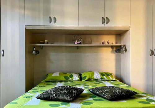 Un pat sau paturi într-o cameră la Casa al mare vicino Roma