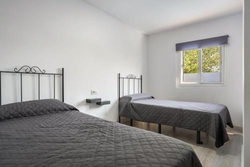 Postel nebo postele na pokoji v ubytování Casa Lidia