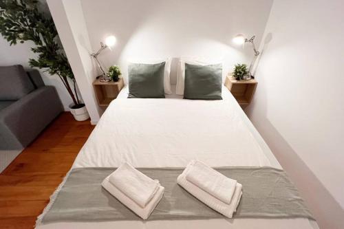 Tempat tidur dalam kamar di Ventana al Cielo de Cudillero by Batuecas