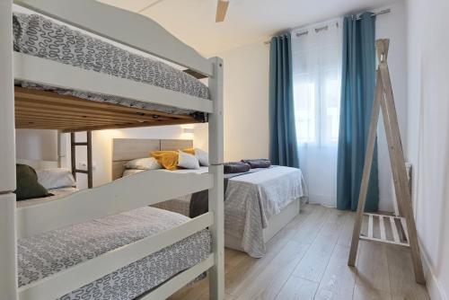 En eller flere senge i et værelse på LEON INMO Apartment Chanel - 15777