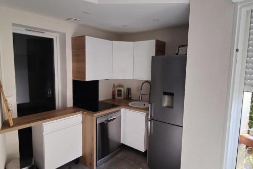 Η κουζίνα ή μικρή κουζίνα στο Appartement 6-8 pers, proche mer