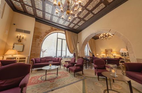 Ein Sitzbereich in der Unterkunft Algilà Ortigia Charme Hotel